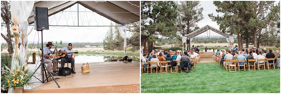 A beutiful outdoor ceremony on an outdoor stage overlooking a large pond. 