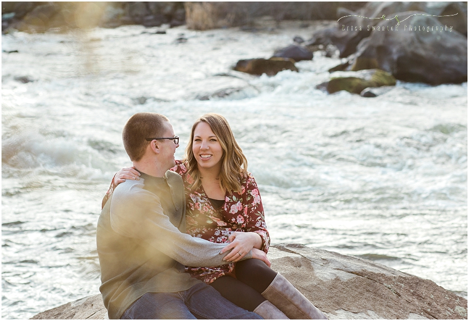 A stunning bride-to-be makes beautiful eye contact with the camera in a carefree outdoor engagement photo session along the river in Bend, OR. 