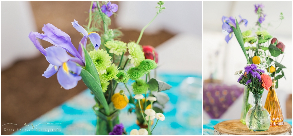 Colorful flowers in vintage vases dress the table top at this rustic backyard wedding in Central Oregon. 