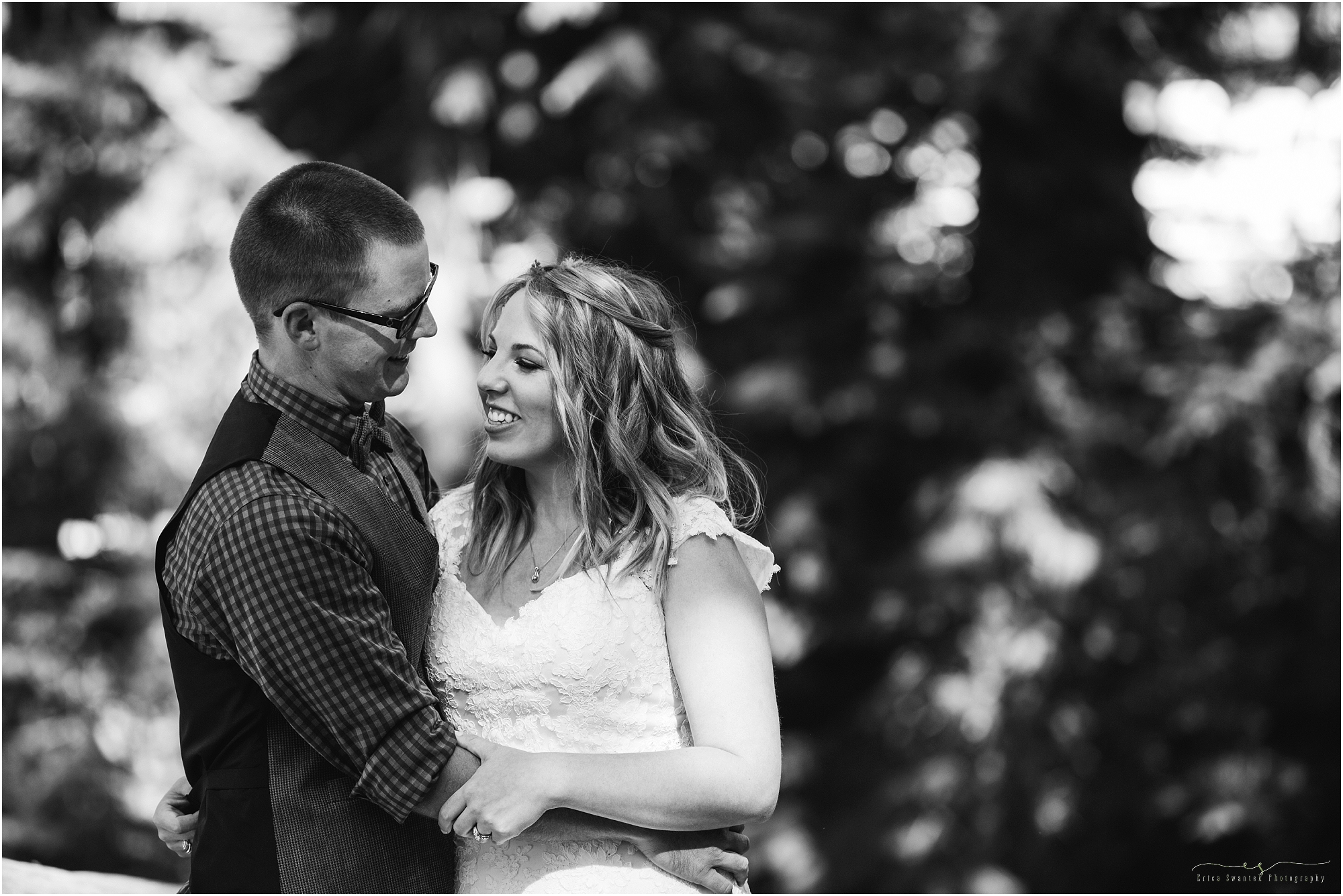A classic black and white image of a couple looking at each other at their Skyliner's Lodge wedding in Bend, Oregon. | Erica Swantek Photography