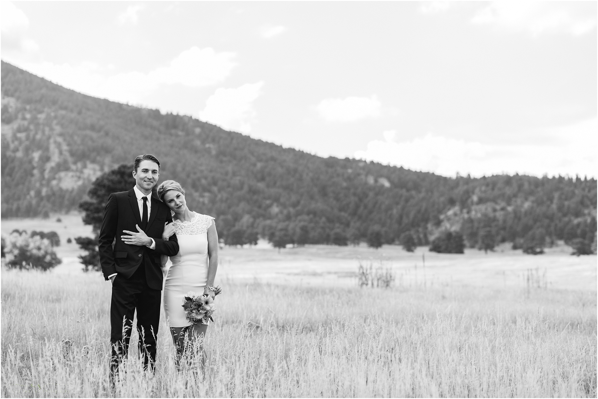 A classic black and white image of a wedding couple wearing classy wedding attire at this Evergreen CO photographer shootout event. 