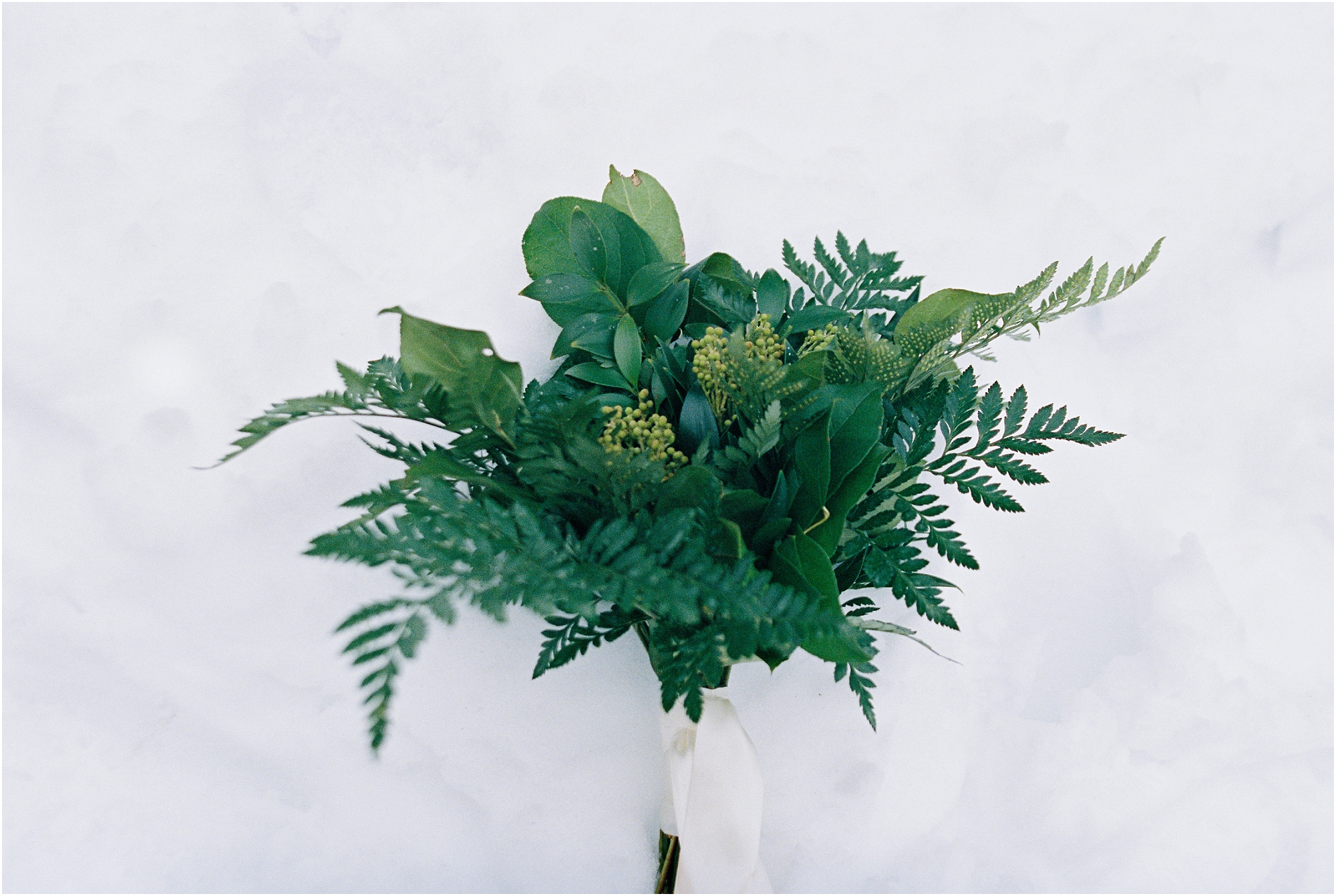A gorgeous greenery bouquet shot on film. 