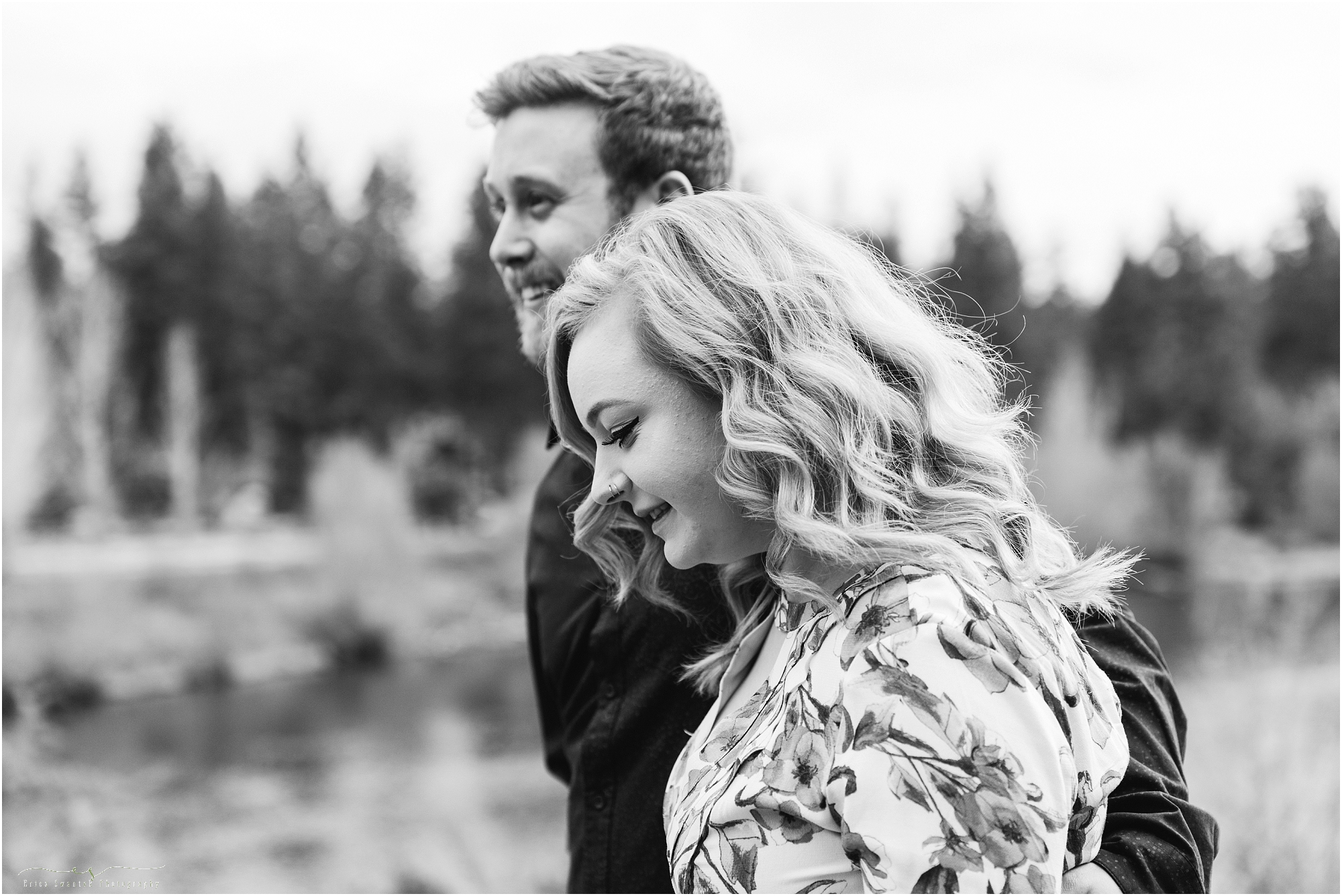 A black and white engagement photo of a deschutes river spring engagement session in Bend, OR. 