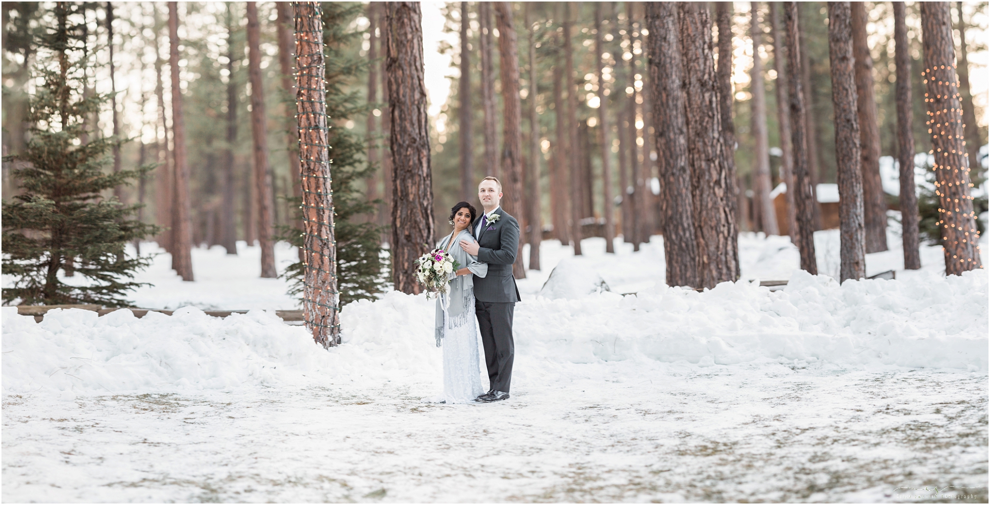 A gorgeous couple stands in the snow and tall pine trees as the sun is setting behind them for their Five Pine Lodge winter wedding in Sisters, Oregon. | Erica Swantek Photography