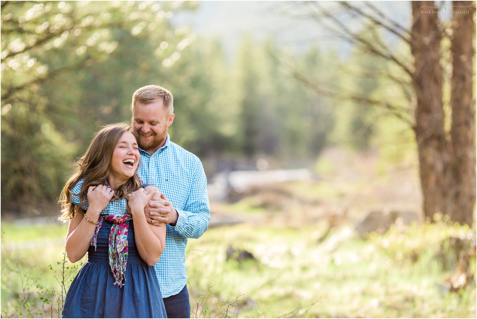 A joyous couple laughs at their outdoor Tumalo Creek engagement session in Bend, Oregon. 