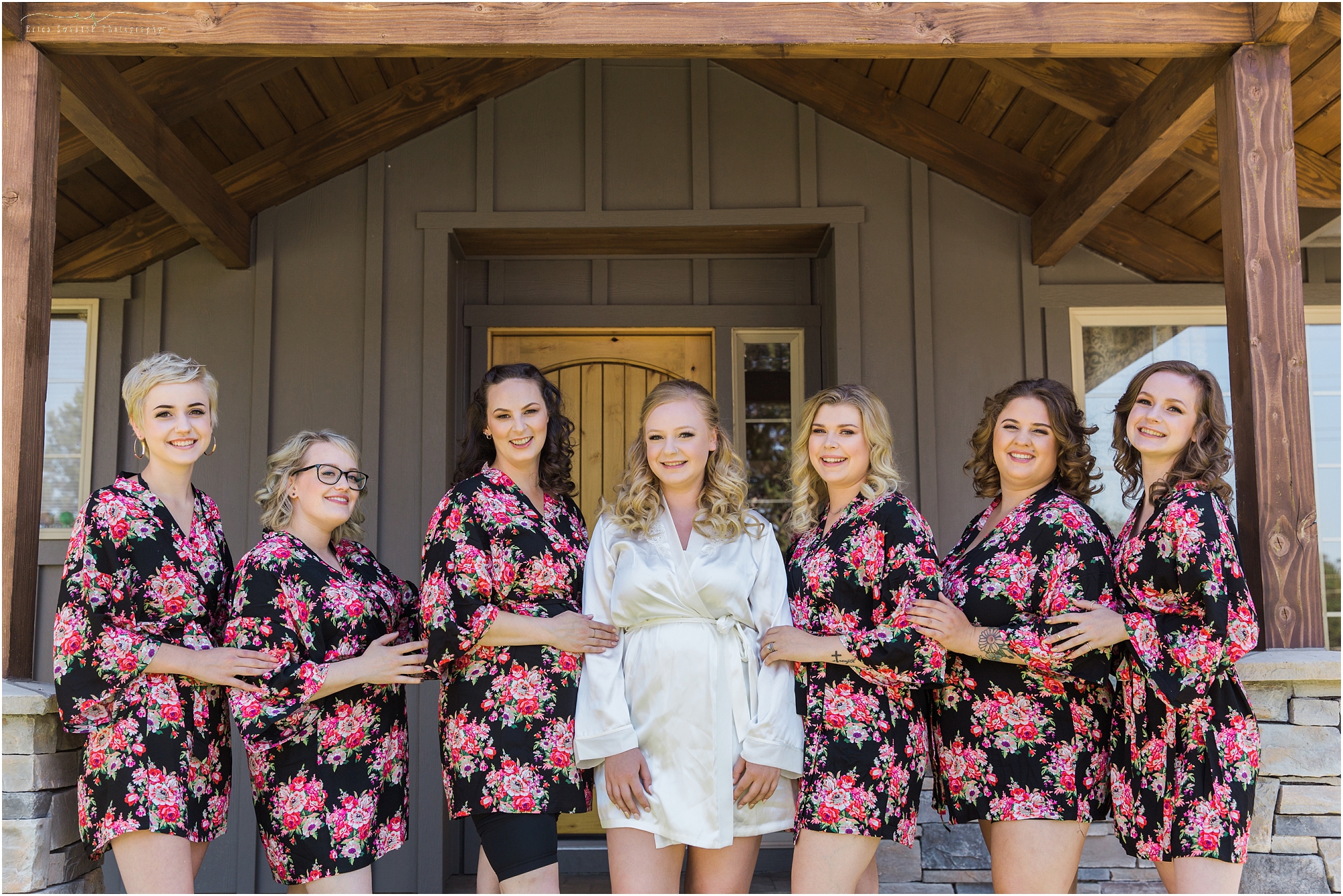 Beautiful satin floral robes are the perfect thing for your bridesmaids by Bend wedding photographer Erica Swantek Photography. 