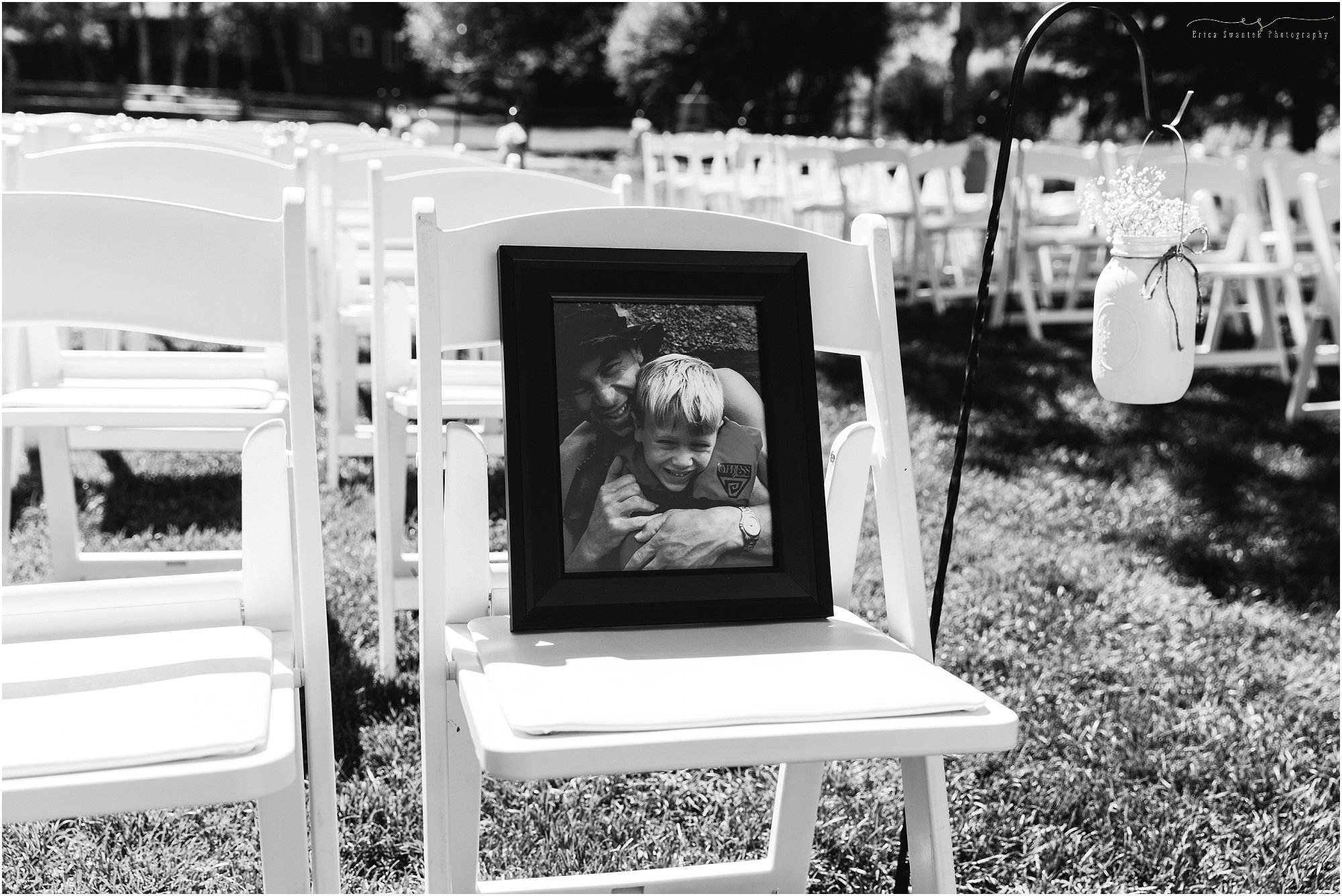 A treasured photo holds the place for a family member who is no longer with us at a wedding ceremony in Bend, OR. 