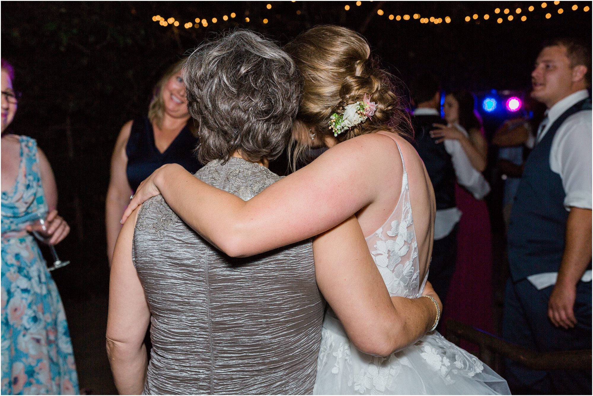This bride and her mother share a special embrace on the dance floor of her Bend, OR Rock Springs Ranch wedding. | Erica Swantek Photography