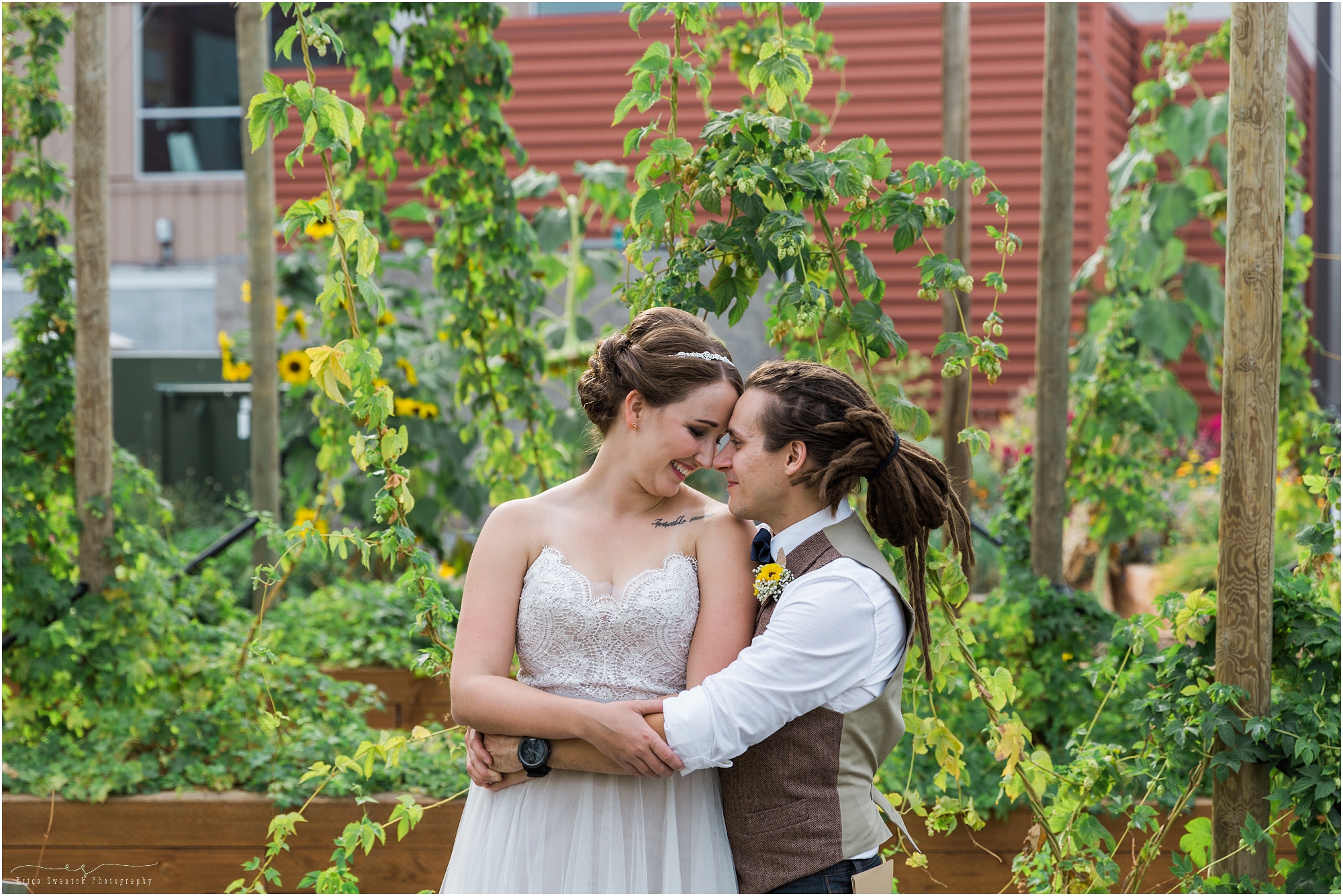 A gorgeous couple's romantic wedding portraits outside in the hop gardens at Worthy brewery. Photographed by Bend Oregon wedding photographer Erica Swantek Photography. 