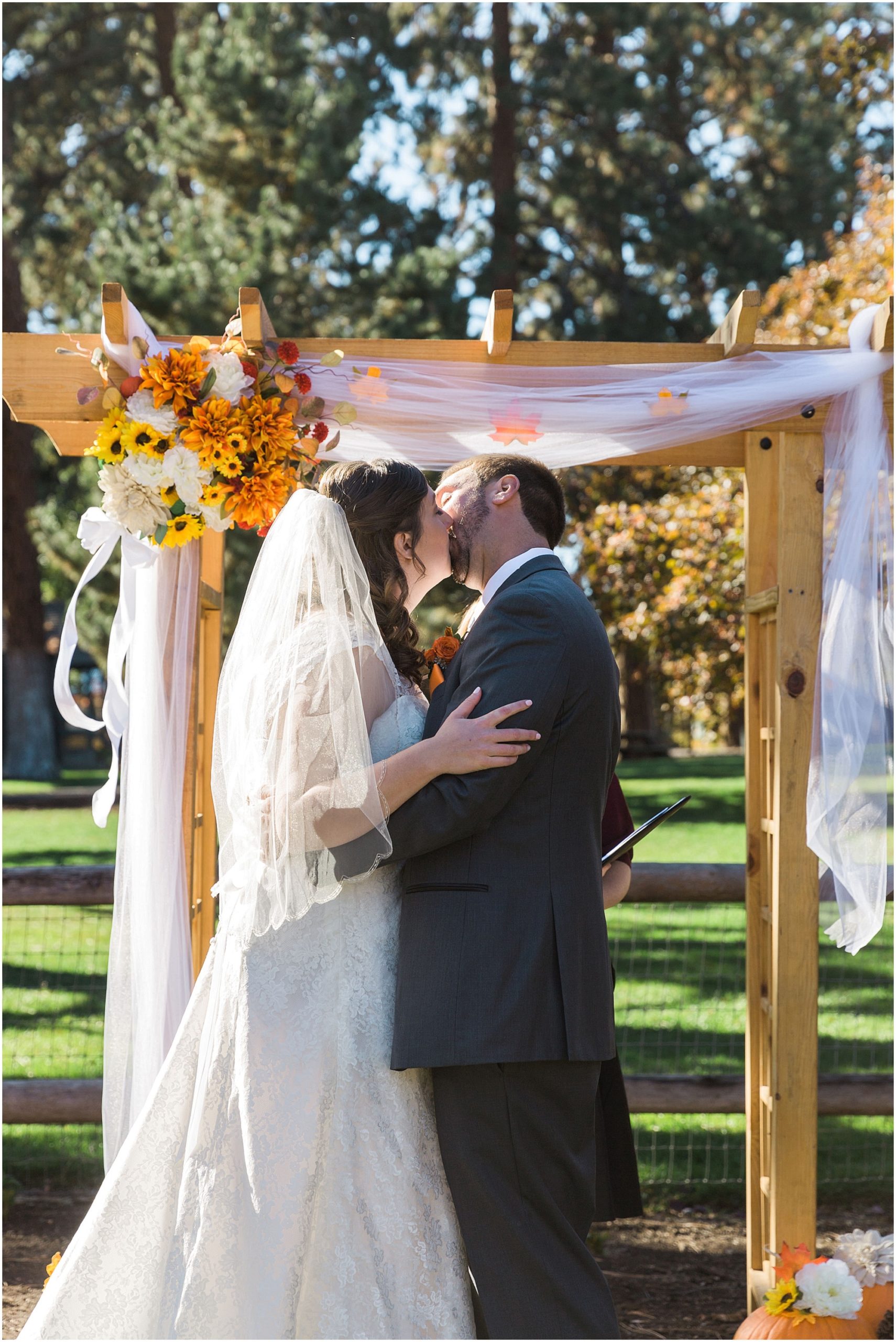 The first kiss as husband and wife for this Hollinshead Barn fall wedding in Bend, OR. | Erica Swantek Photography