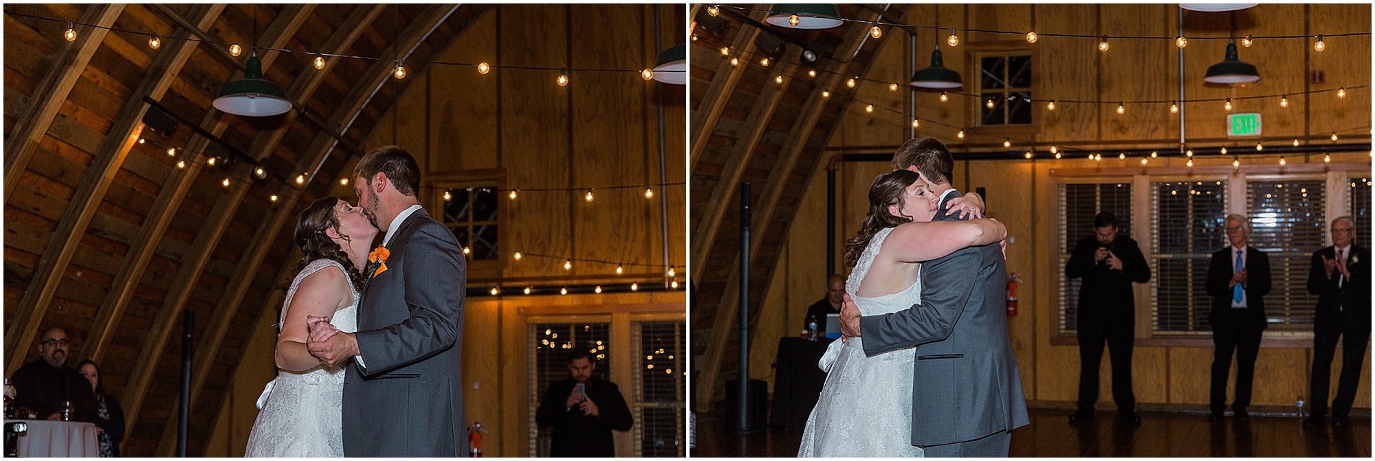 A newly married couple has their first dance upstairs in the gorgeous hardwood interior of Hollinshead Barn in Bend, OR. | Erica Swantek Photography
