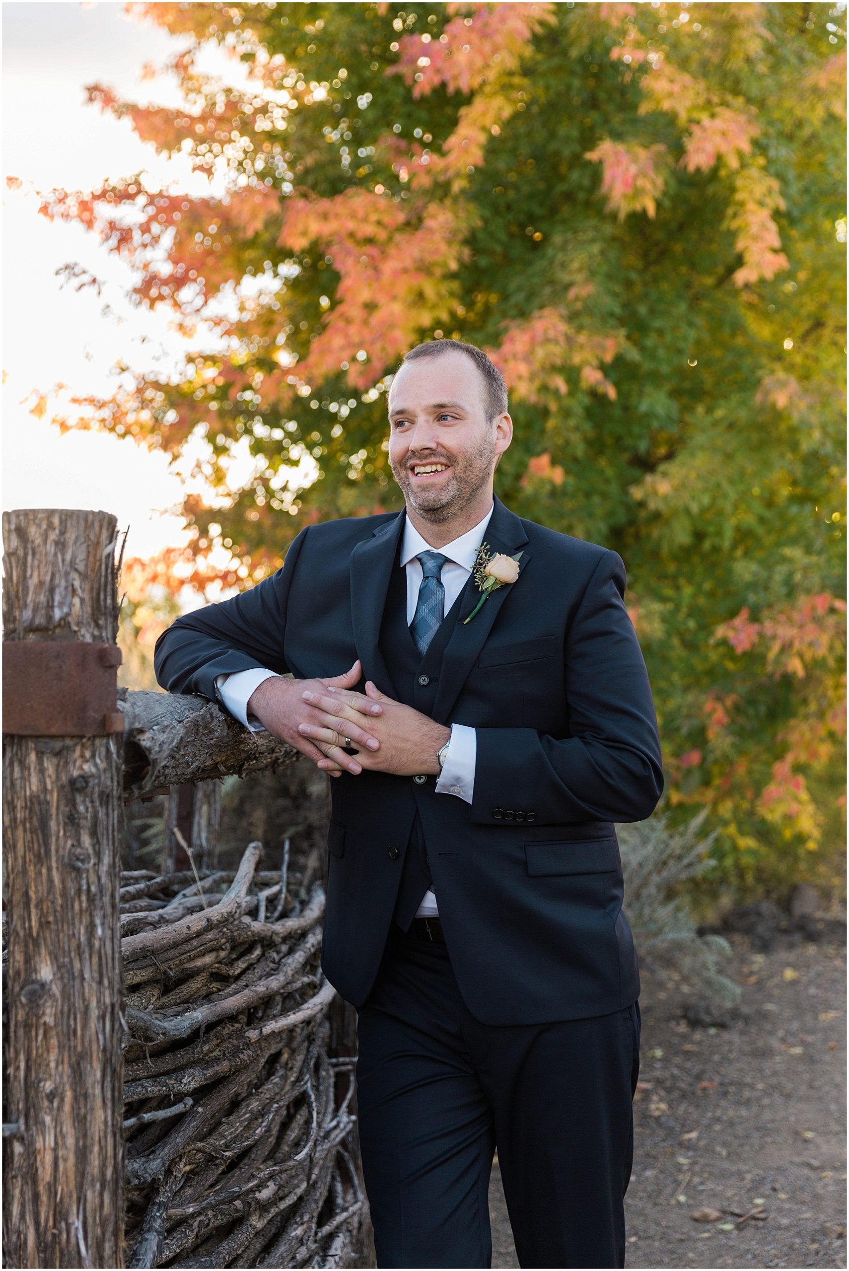 The groom admires his bride during her bridal portraits at this Ranch at the Canyons fall wedding. | Erica Swantek Photography