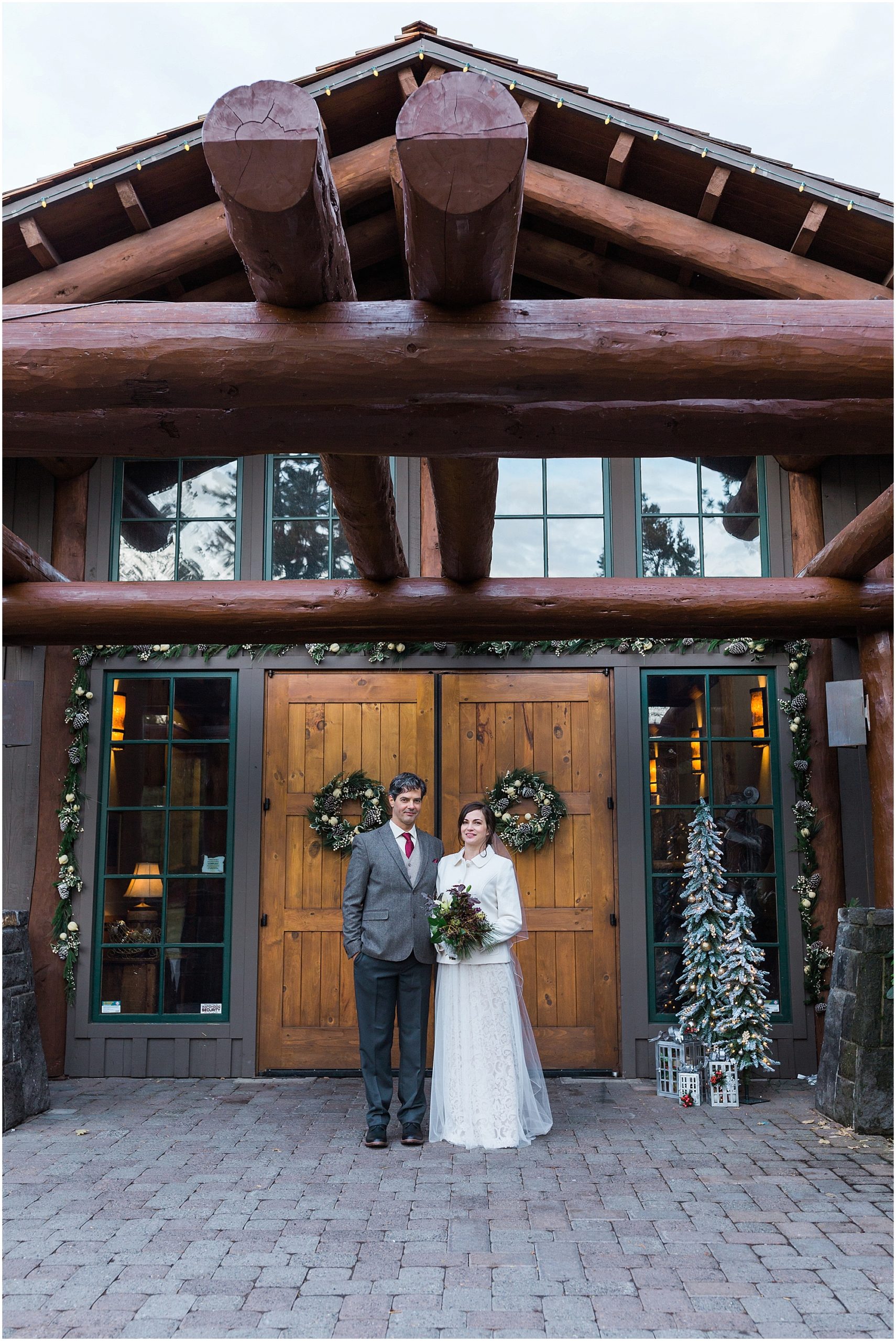 Sunriver Resort is all decorated for the holiday season and makes for a beautiful wedding portrait of the happy couple. | Erica Swantek Photography