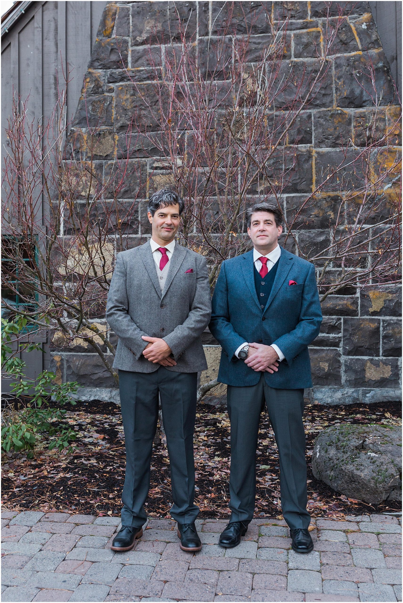 A groom and his brother pose for a family portrait before his Sunriver Resort winter wedding in Oregon. | Erica Swantek Photography