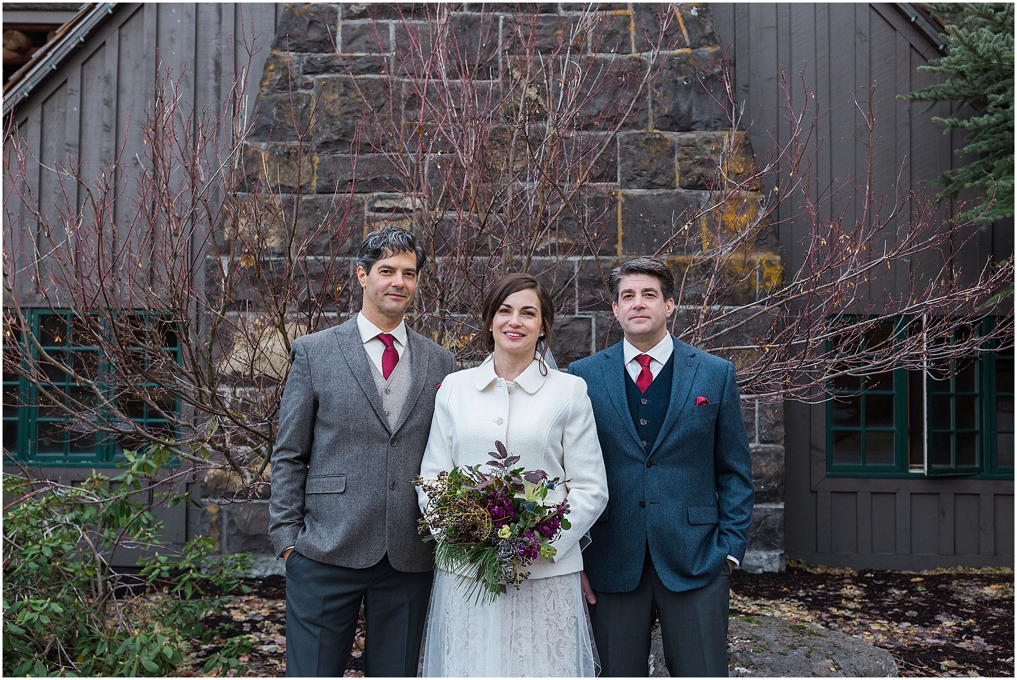 A groom and his brother pose for a family portrait with his new bride before his Sunriver Resort winter wedding in Oregon. | Erica Swantek Photography