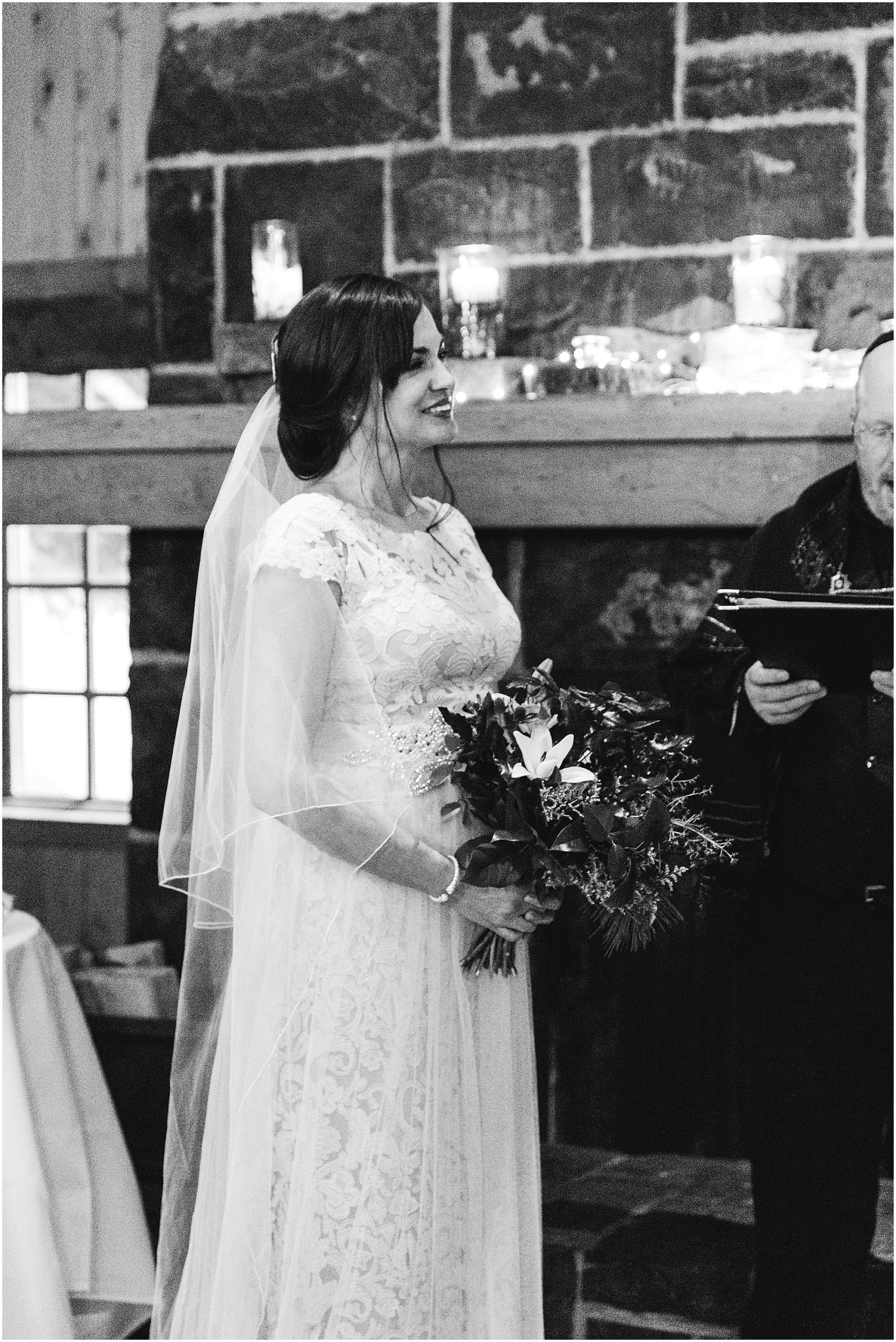 A gorgeous bride says her vows during her intimate wedding at Sunriver Resort near Bend, OR. | Erica Swantek Photography