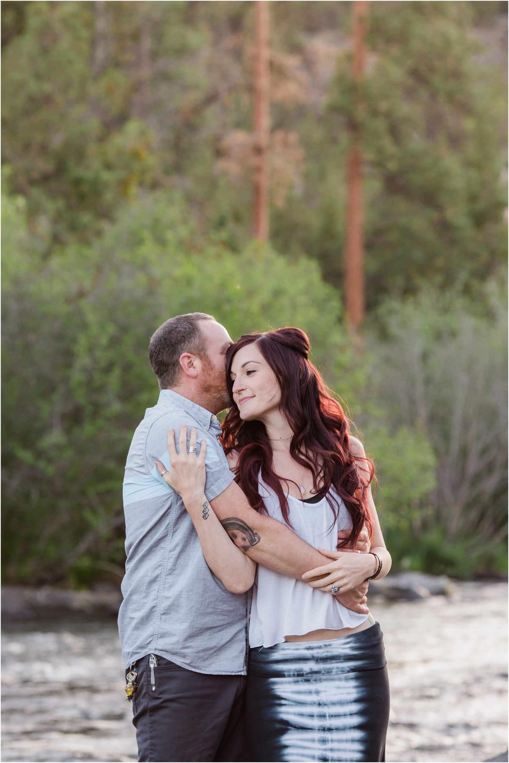 A stunning bride-to-be snuggles in with her man at their Oregon adventurous engagement session. Photographed by Bend wedding photographer Erica Swantek Photography. 