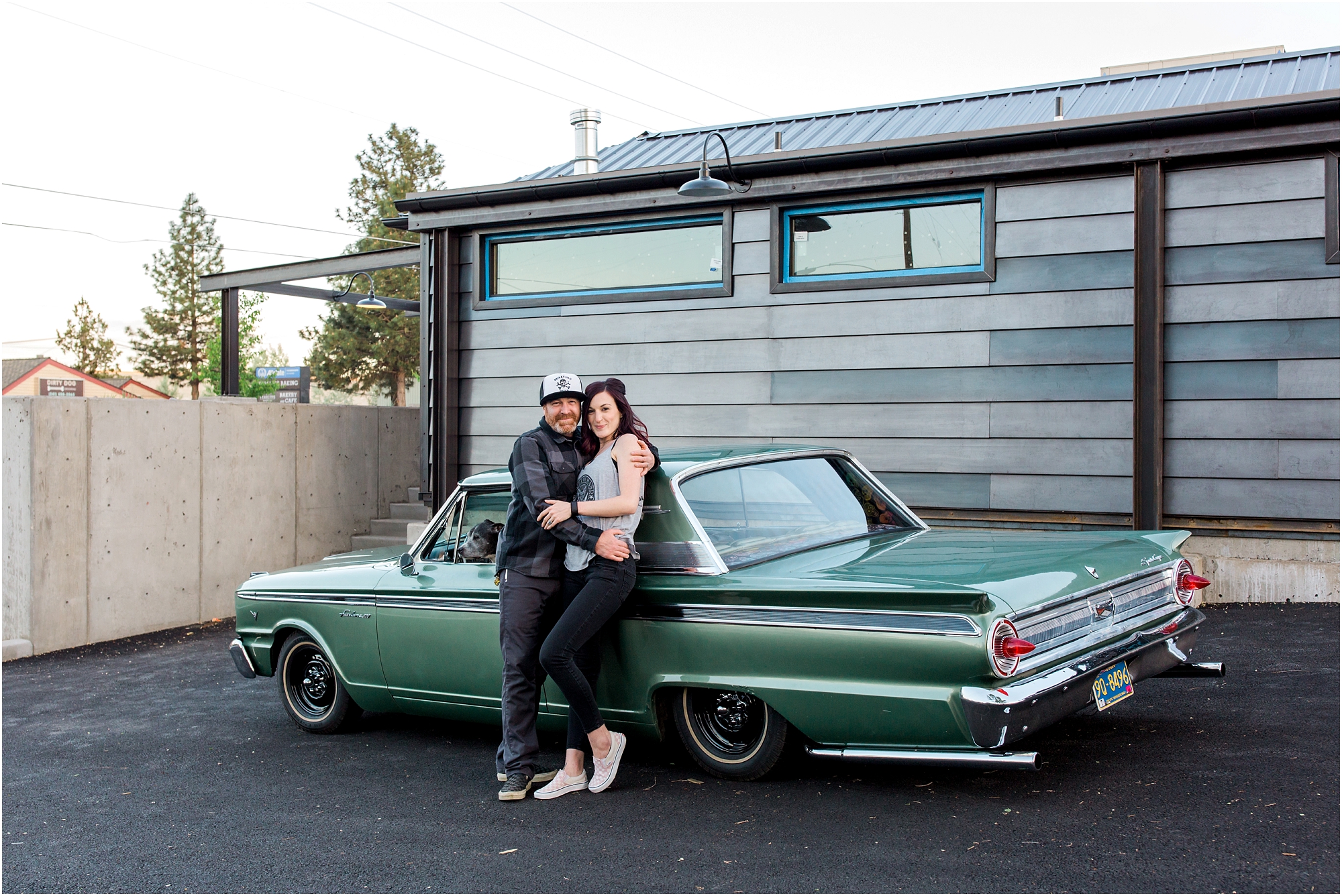 The cutest couple with their classic car at this Bend engagement session with dogs in Central Oregon. | Erica Swantek Photography