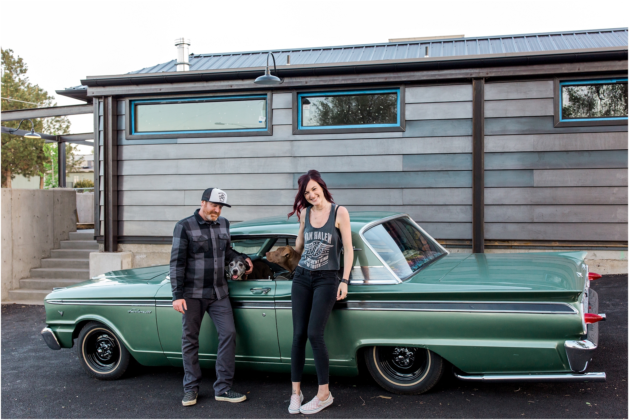 Boneyard Beer Pub in Bend serves as the location for this couple's Bend engagement session with dogs. | Erica Swantek Photography