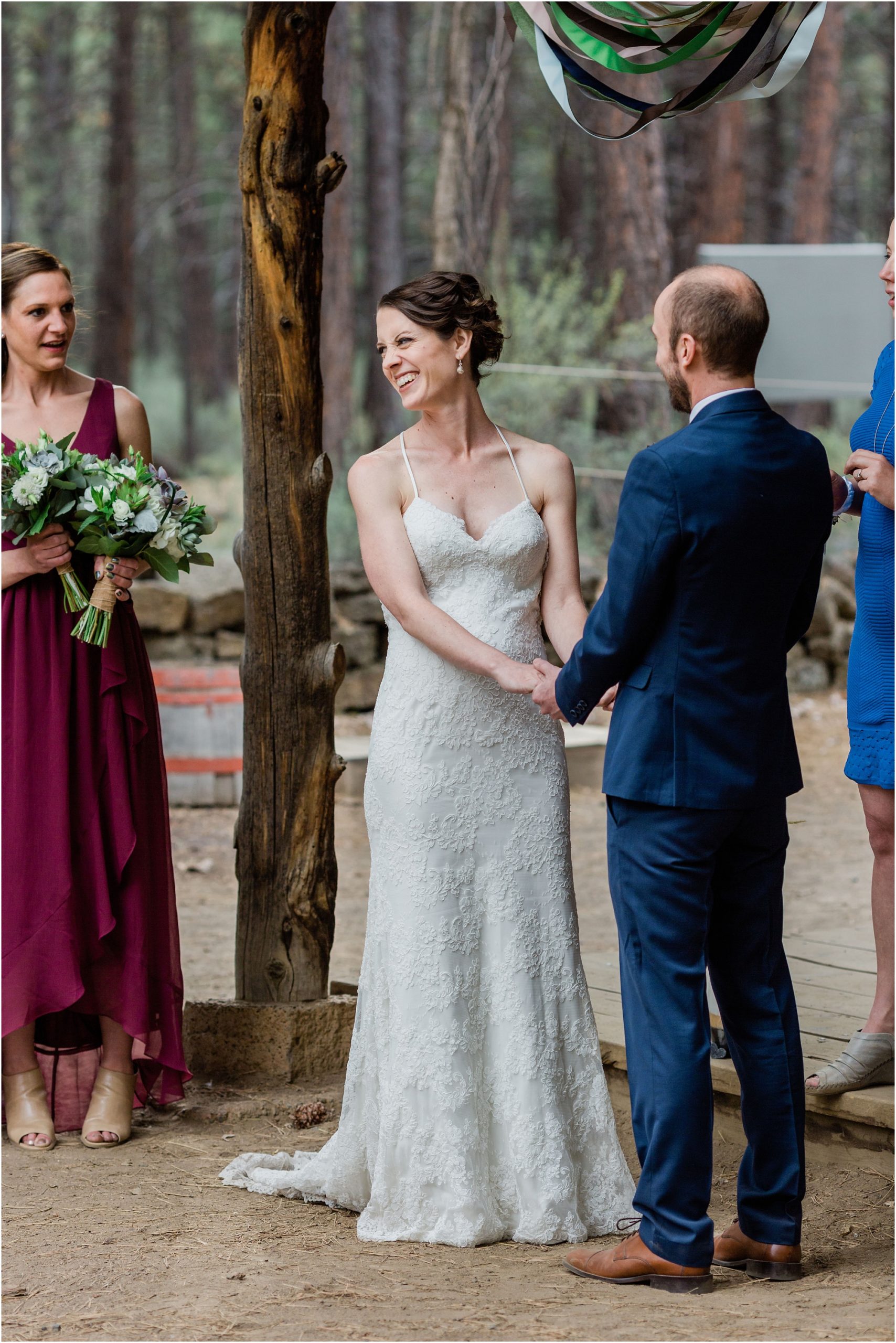This beautiful bride is all smiles as she holds hands with her handsome groom at her rustic outdoor wedding in Bend, OR. | Erica Swantek Photography