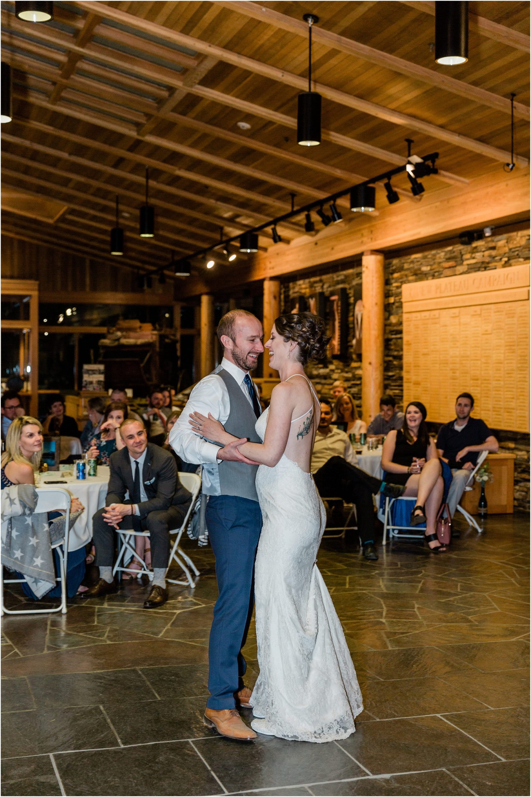 A first dance as a married couple inside the Schnitzer Entrance Hall of the High Desert Museum wedding venue in Bend, OR. | Erica Swantek Photography