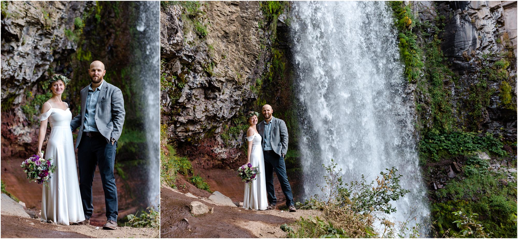 A bride in a Reformation flutter sleeve white dress and groom in a navy and dusty blue sport coat pose under the raging waterfall at their Tumalo Falls elopement in Bend, OR. | Erica Swantek Photography