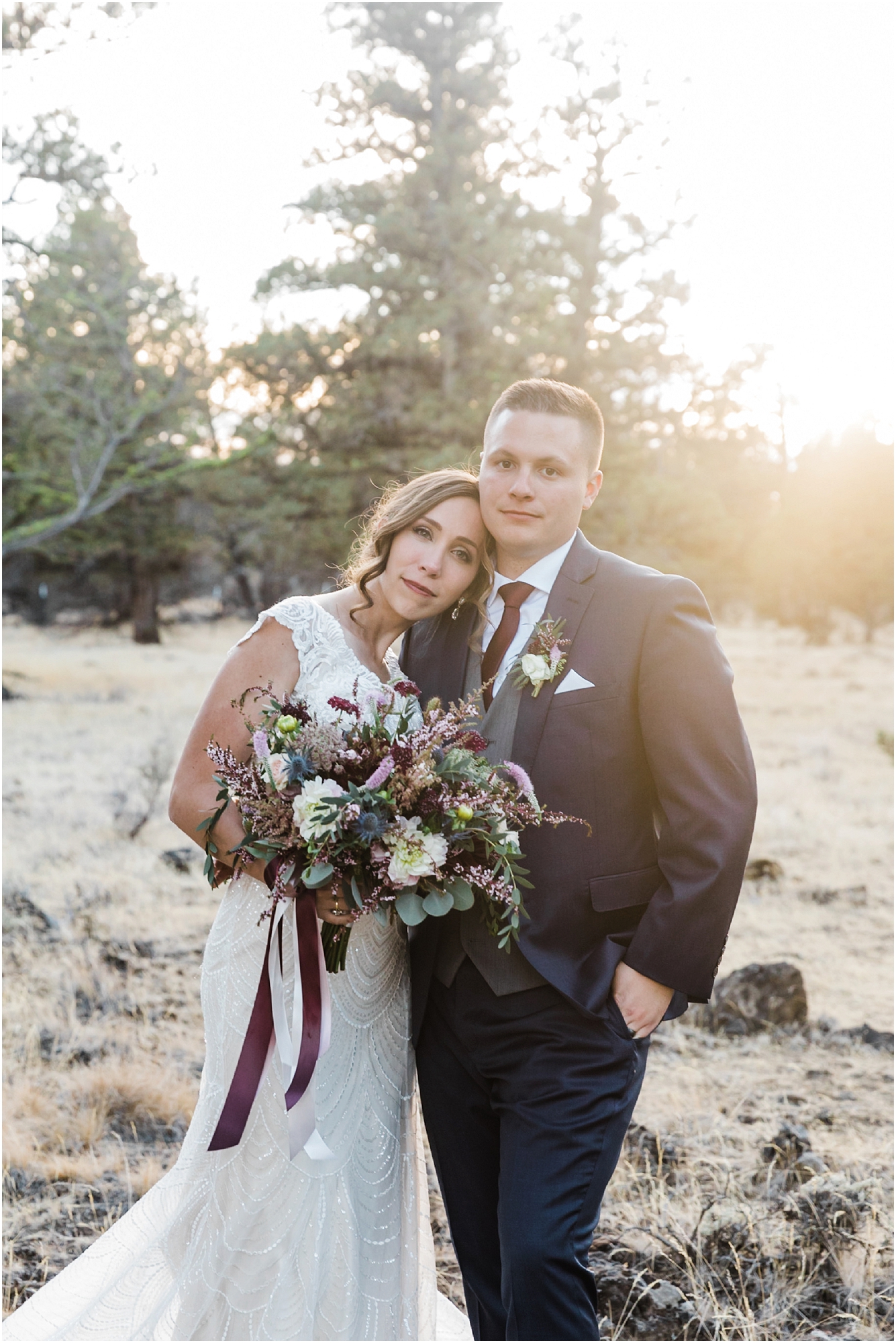 A bride and groom stand amongst the juniper trees in the high desert of Oregon, a beautiful place to elope in Bend Oregon. | Erica Swantek Photography