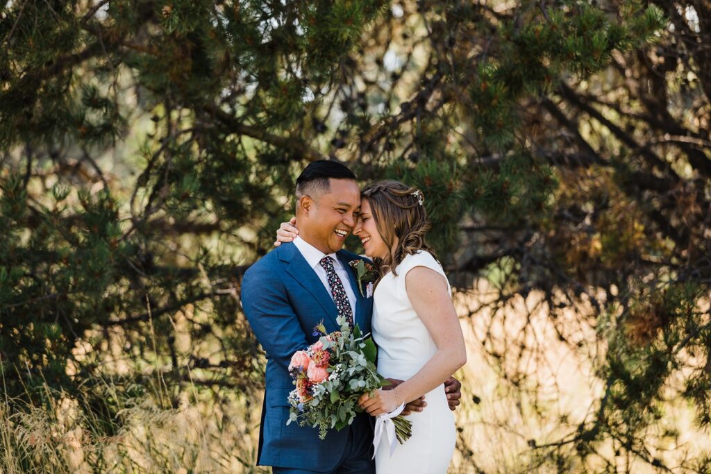 smiling elopement couple hugging during their bend oregon elopement