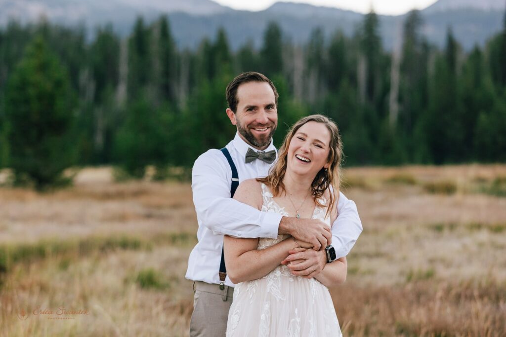 sweet bride and groom hugging at sparks lake