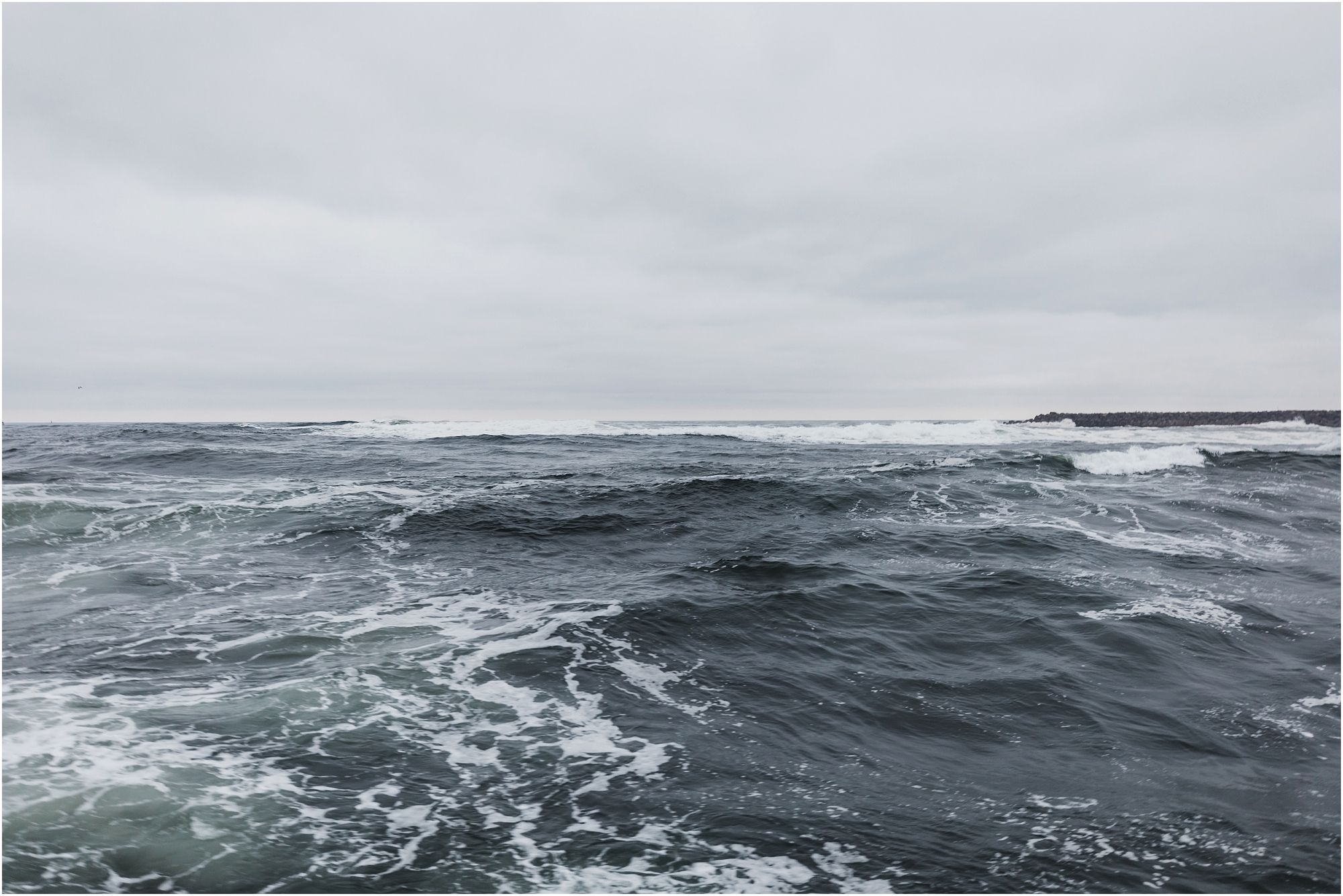 The open ocean lies just ahead in Winchester Bay, Oregon. | Erica Swantek Photography