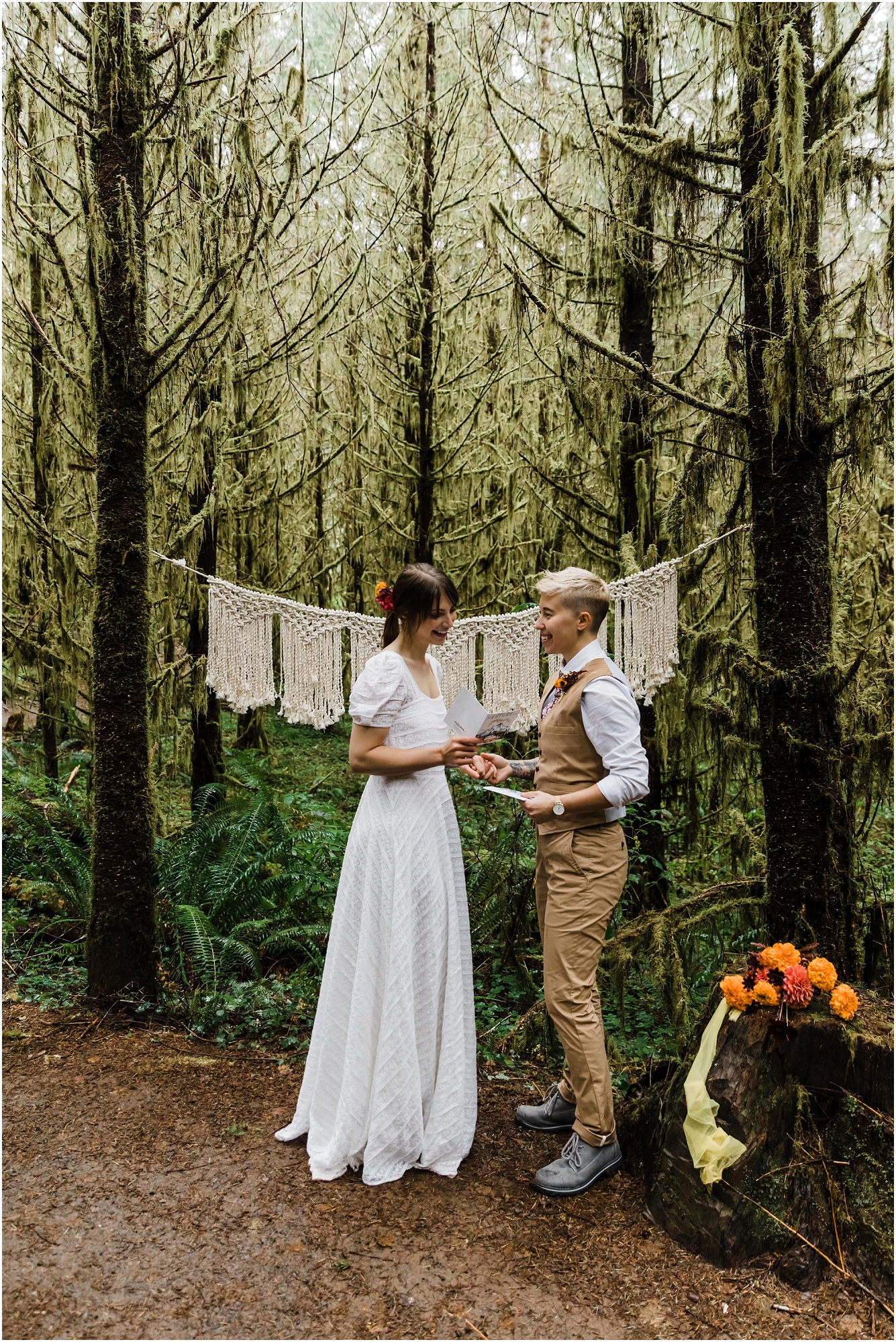 A LGBTQ+ couple shares their wedding vows under the tranquil forest during their PNW hiking adventure elopement in Oregon. | Erica Swantek Photography