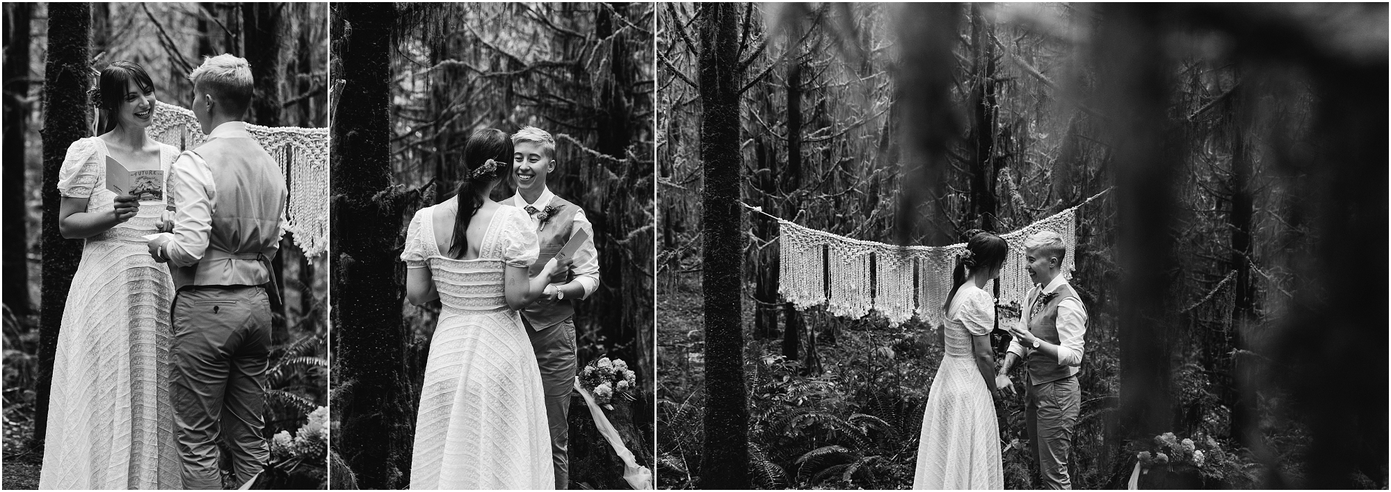 A black and white image of a LGBTQ+ couple holds hands as they read their vows to each other on the Drift Creek Falls trail for their PNW hiking adventure elopement in Oregon. | Erica Swantek Photography