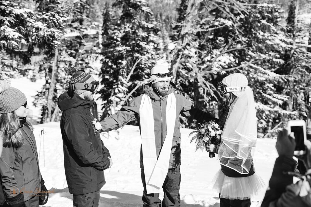 adventurous ski elopement ceremony during winter elopement at mt bachelor