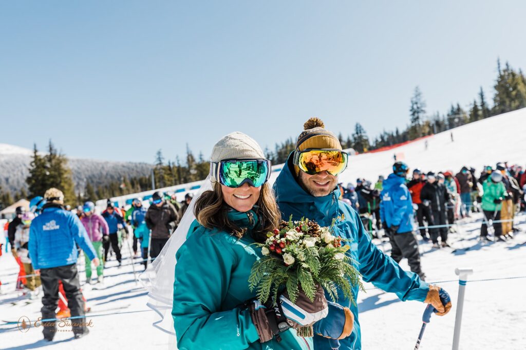 bride and groom posing in their ski gear during their ski elopement a mt bachelor, or