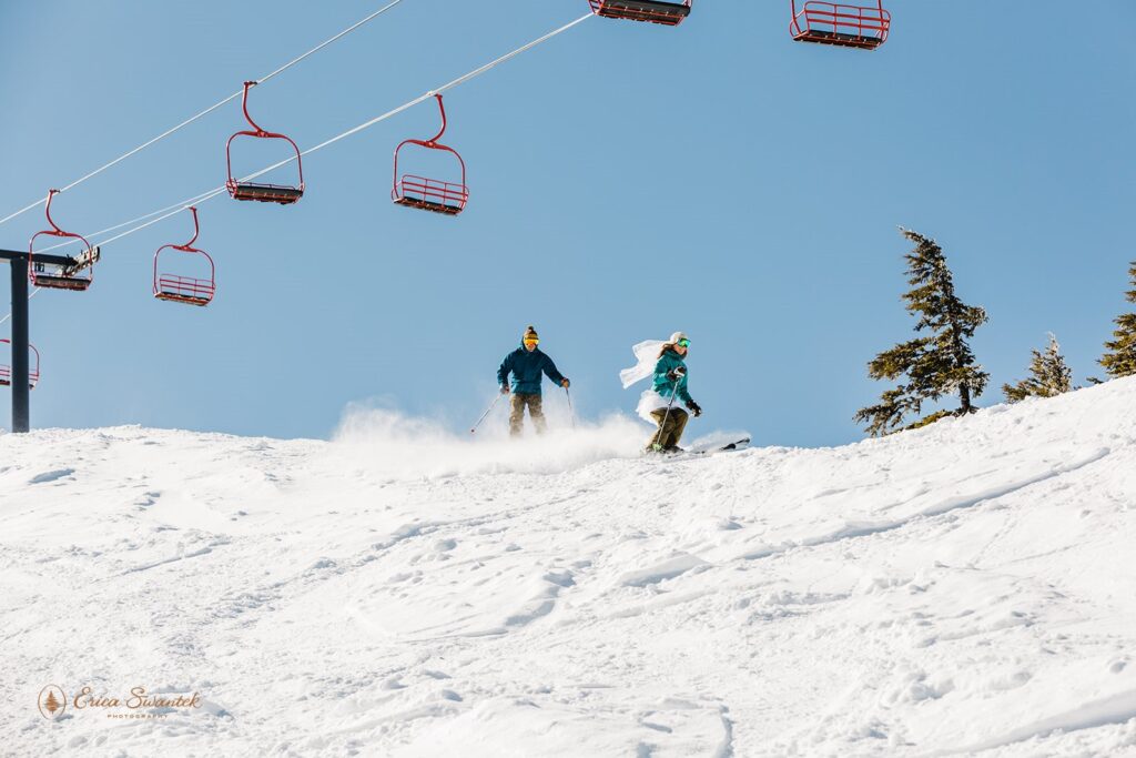 bride and groom skiing down the mountain at mt bachelor