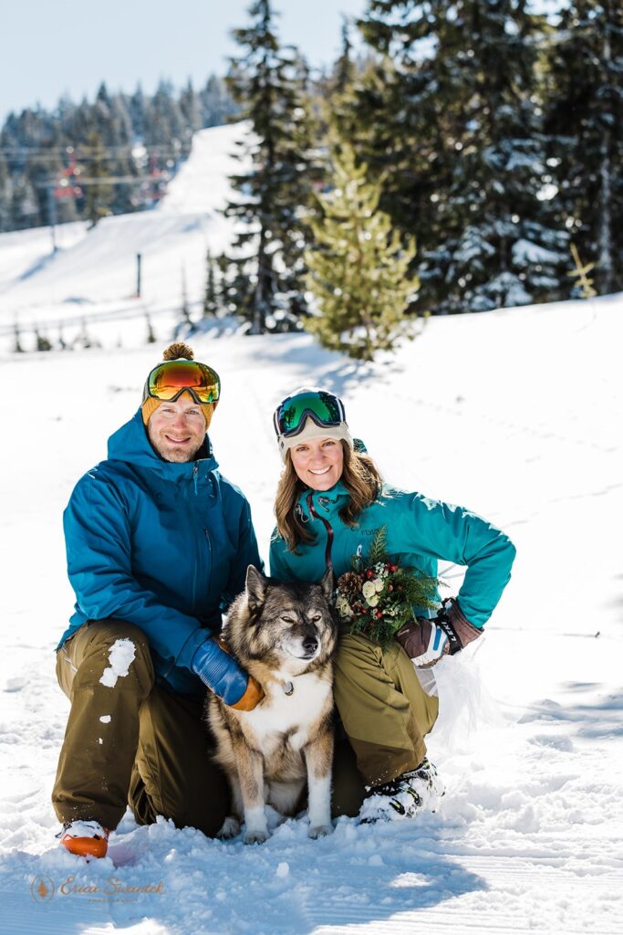 bride and groom in their ski gear during their ski elopement a mt bachelor, or, posing with their pup