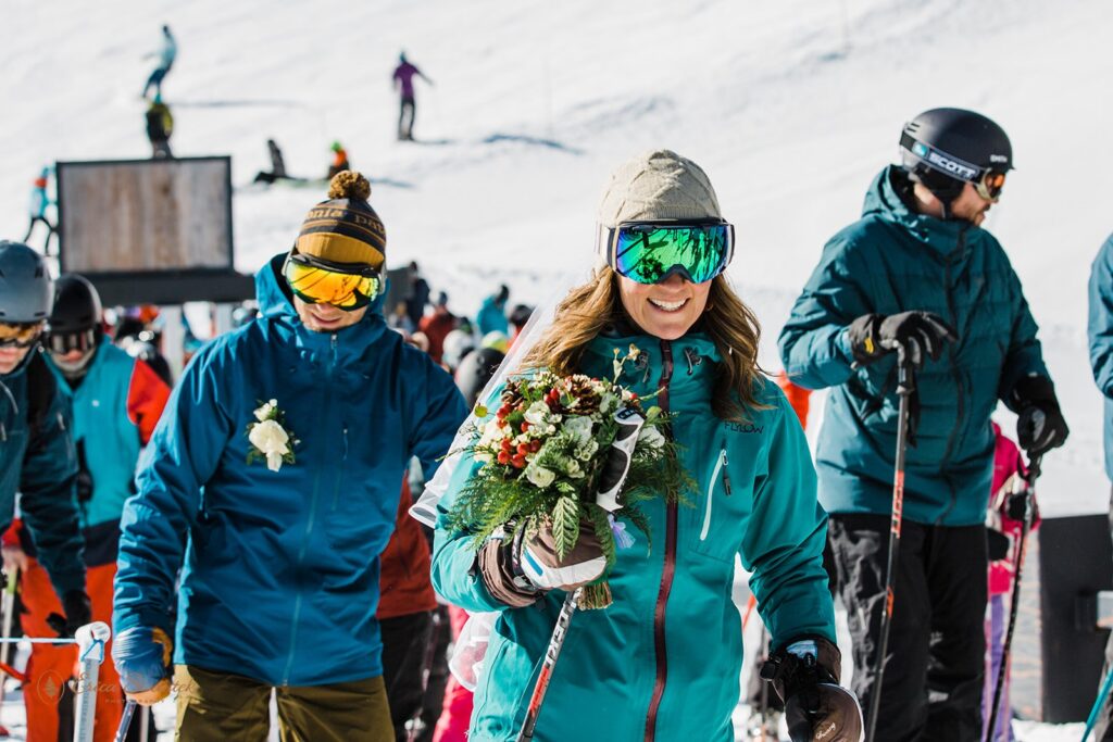 bride and groom with their friends, all in ski gear, at mt bachelor