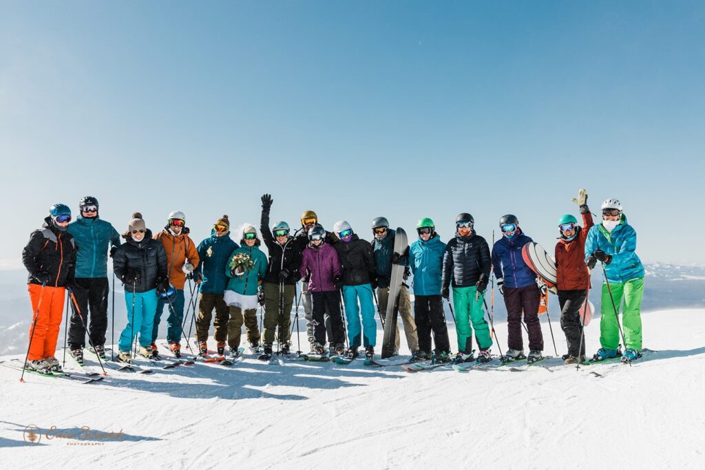 bride and groom with their friends, all in ski gear, at mt bachelor