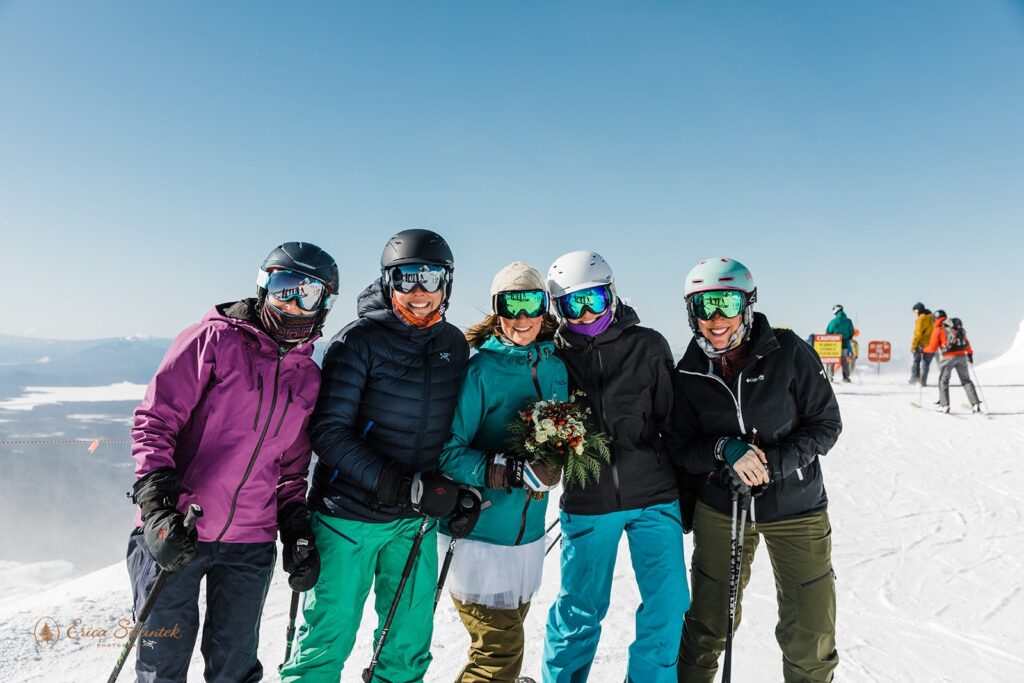 bride and groom with their friends, all in ski gear, at mt bachelor