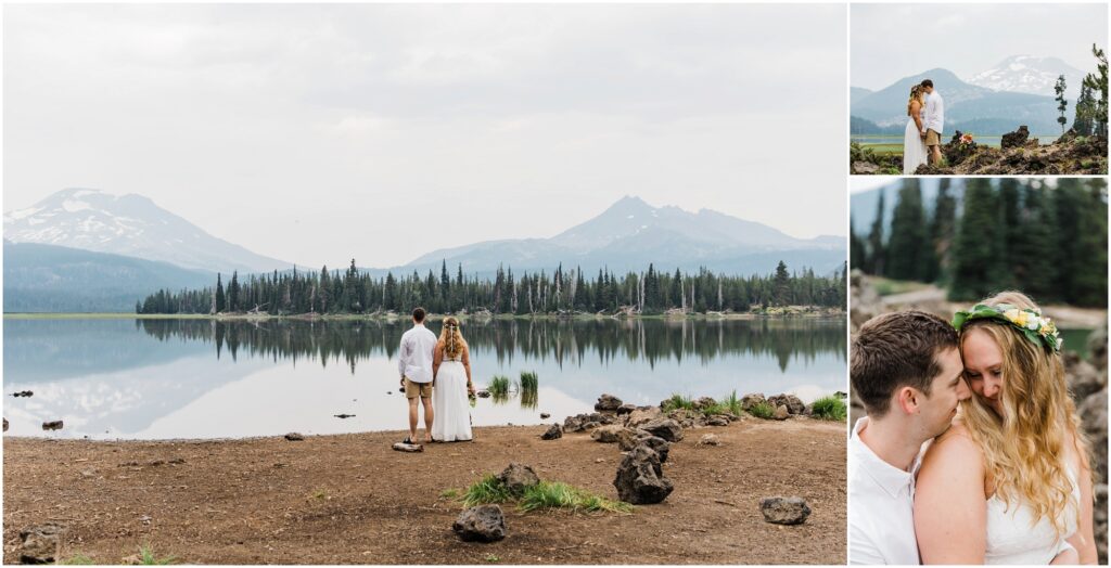 A bride is a white skirt and crop top wearing a floral crown holds her groom's hand while looking out over Sparks Lake to the Cascade Mountains in Bend, Oregon. 