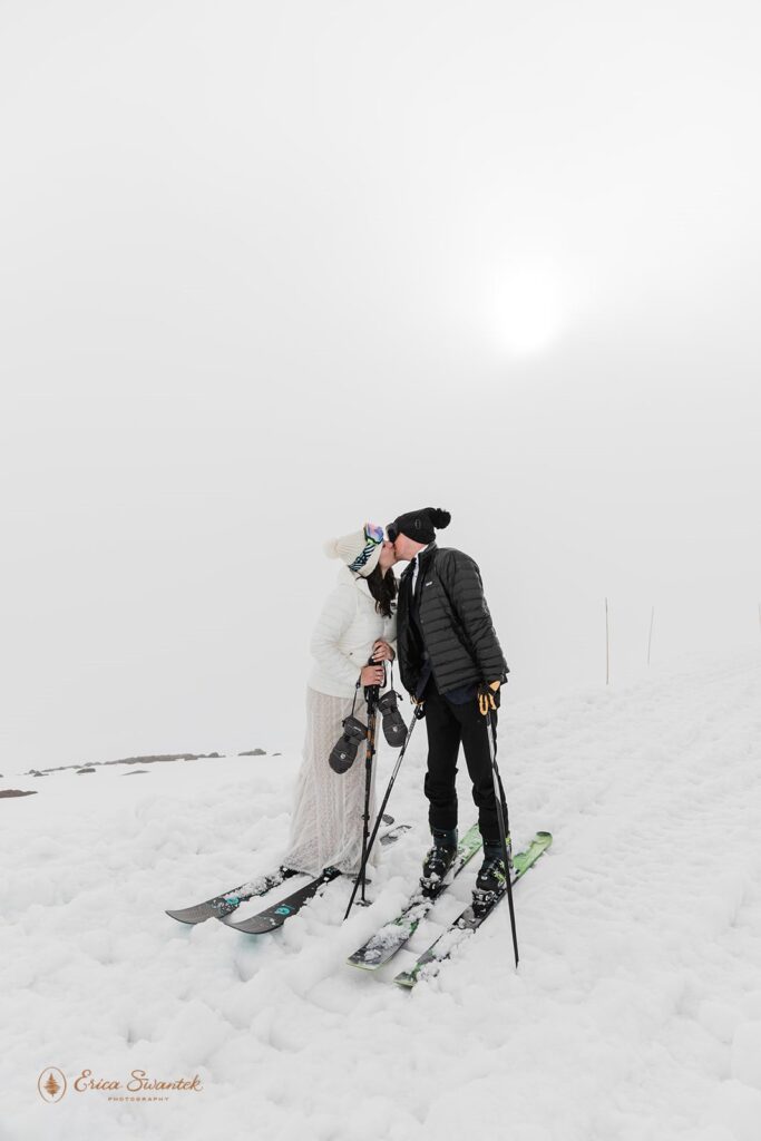 A couple elopes on skis during their elopement in Oregon.