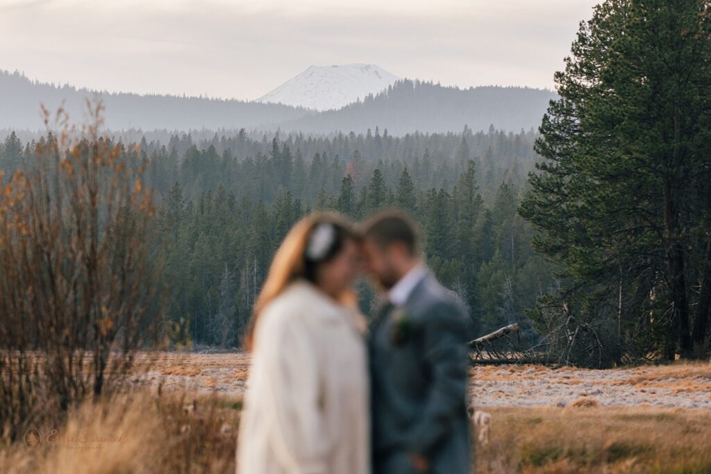 dreamy oregon elopement couple outdoors with fall foliage and mountain views in the backdrop