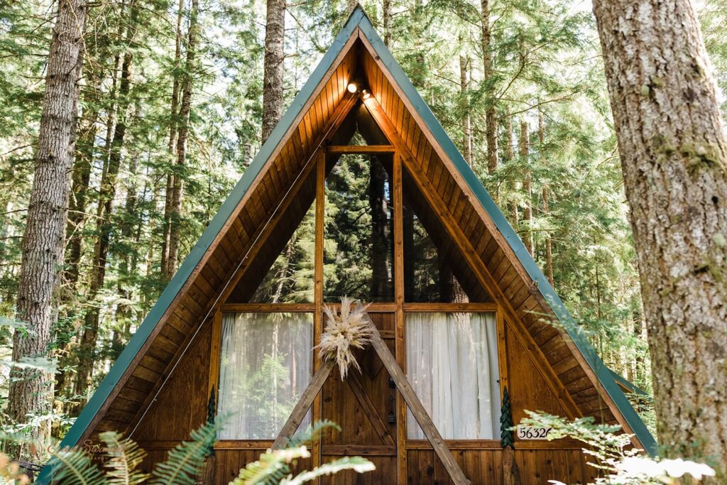 A green-roofed A-Frame Airbnb cabin in Washington State. 