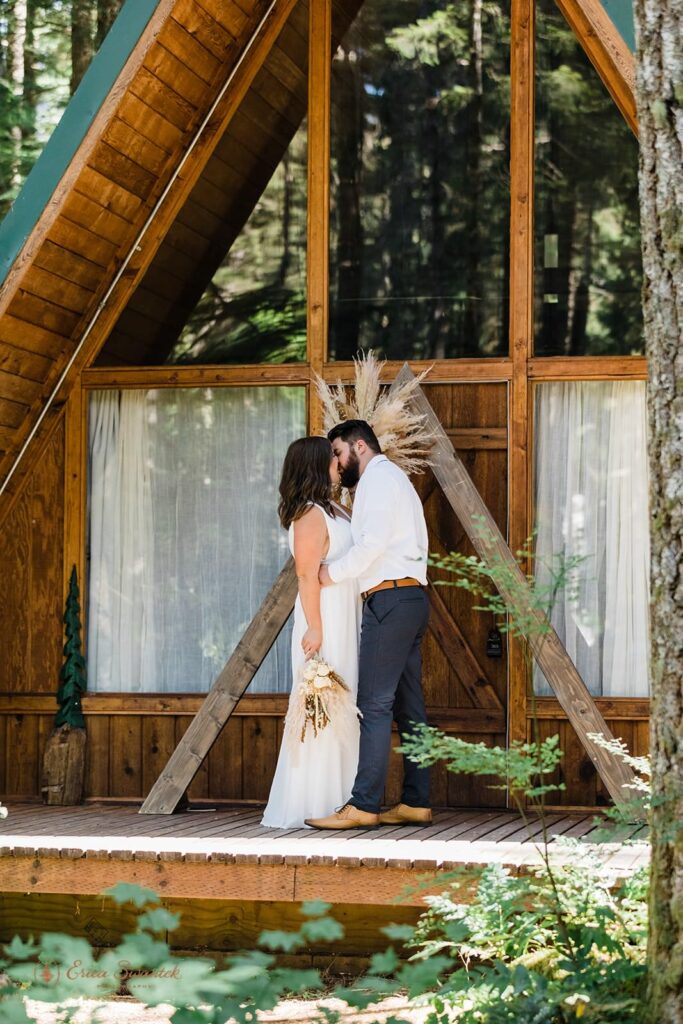 A bride and groom elope in Washington State at an a-frame cabin. 