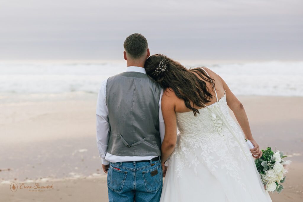 romantic elopement couple during their beach elopement photoshoot in lincoln city