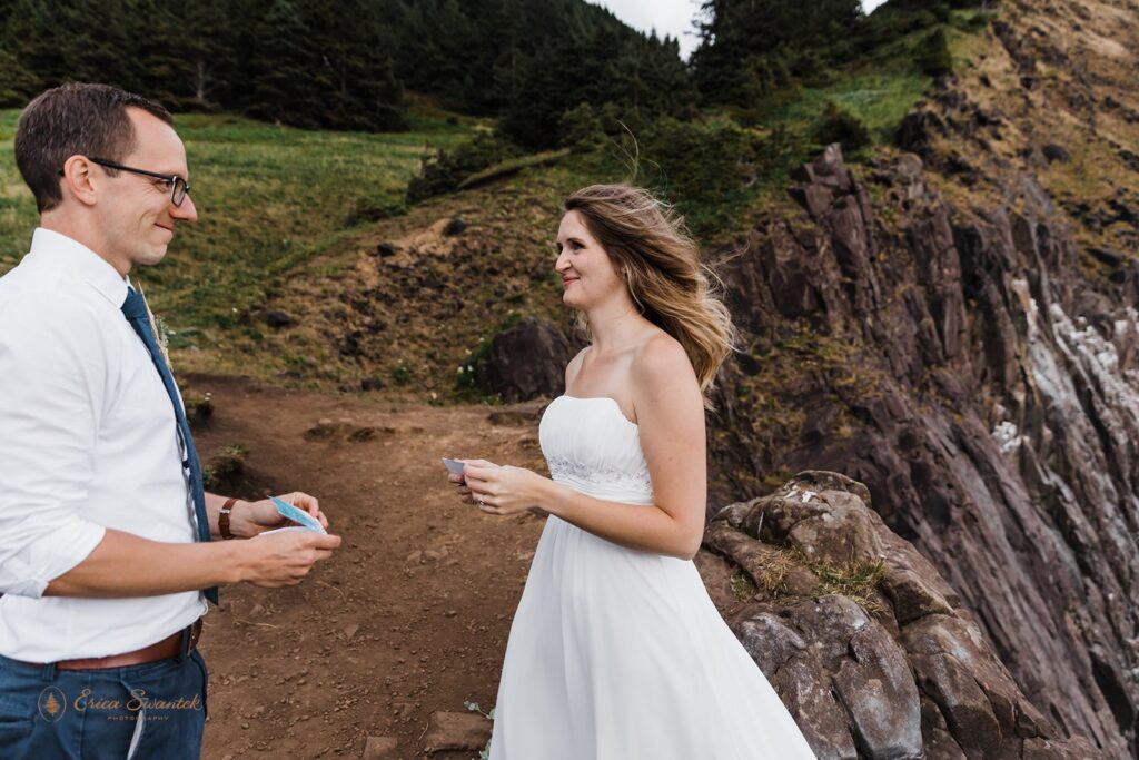 A bride and groom swap love notes during an Elk Flats vow ceremony ceremony.