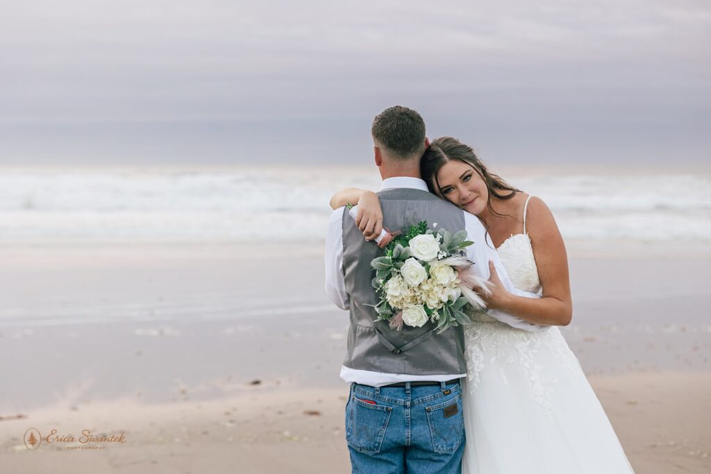 romantic elopement couple during their beach elopement photoshoot in lincoln city