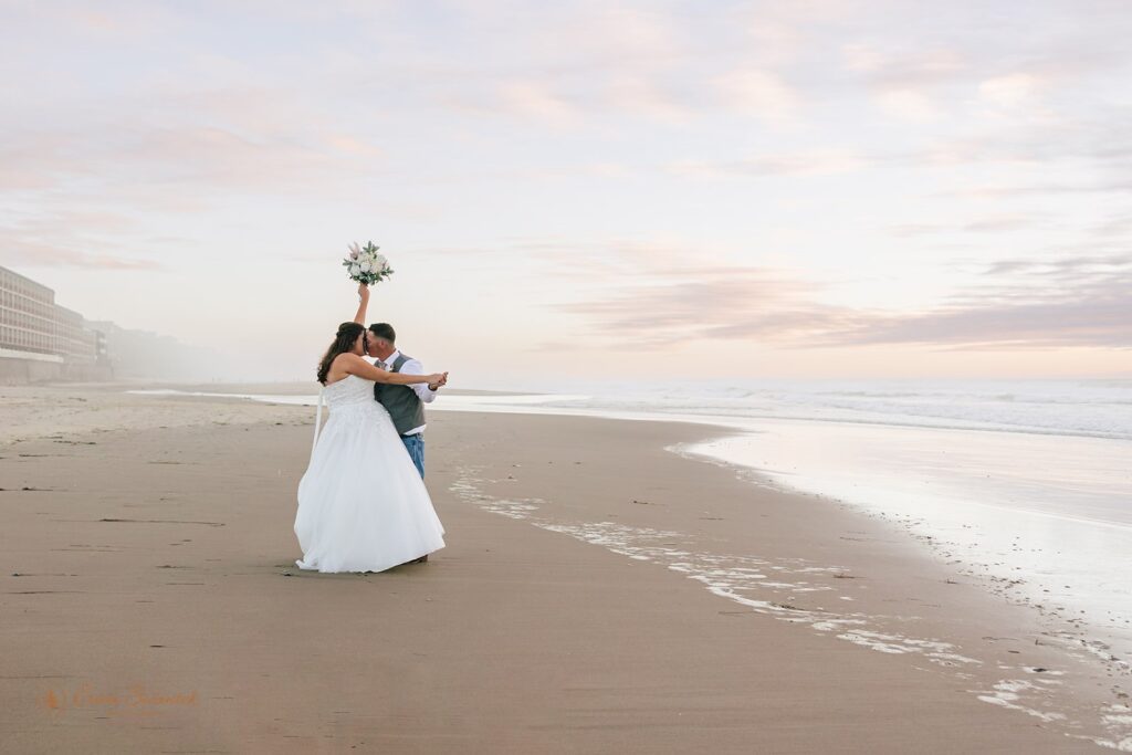 romantic elopement couple during their beach elopement photoshoot in lincoln city