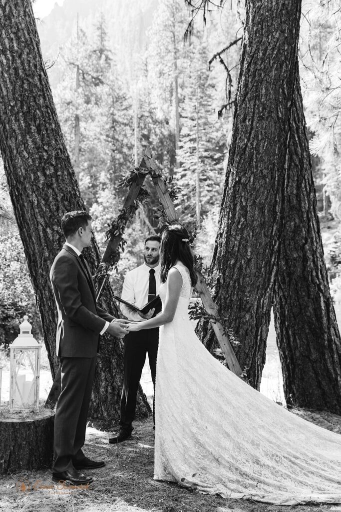 An intimate wedding couple exchanges vows with the help of a Washington wedding officiant along the Naches River. 