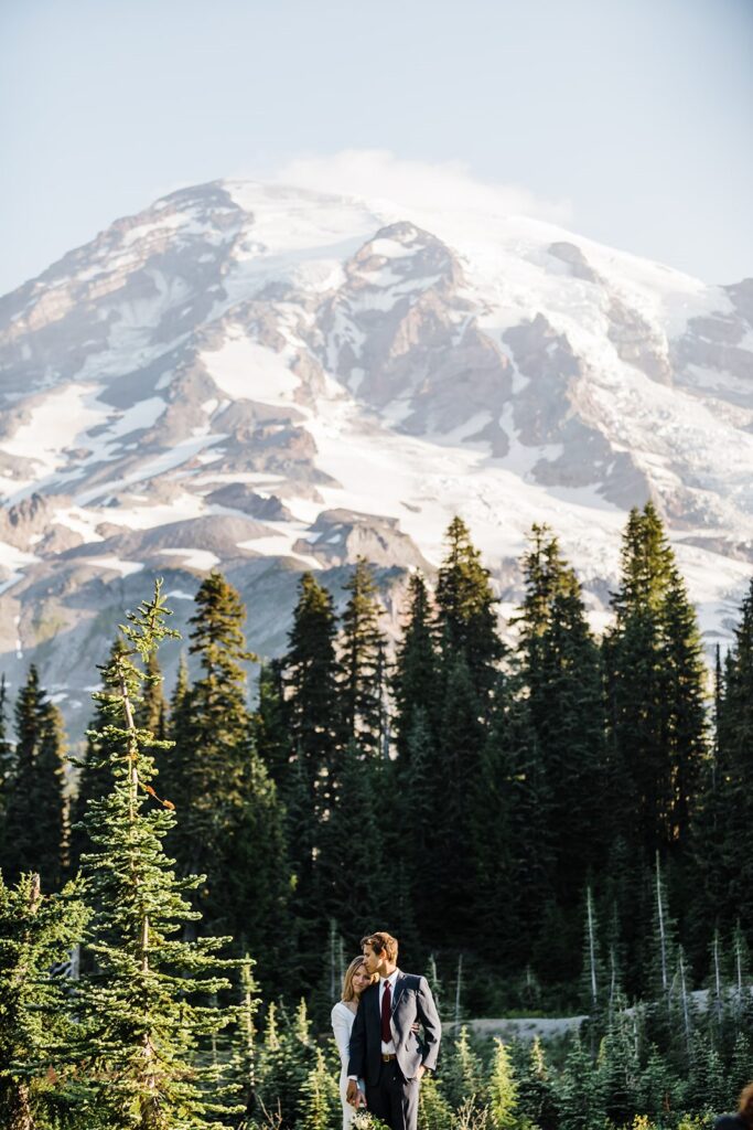 A couple embraces one another during their Mt. Rainier elopement in Washington State.